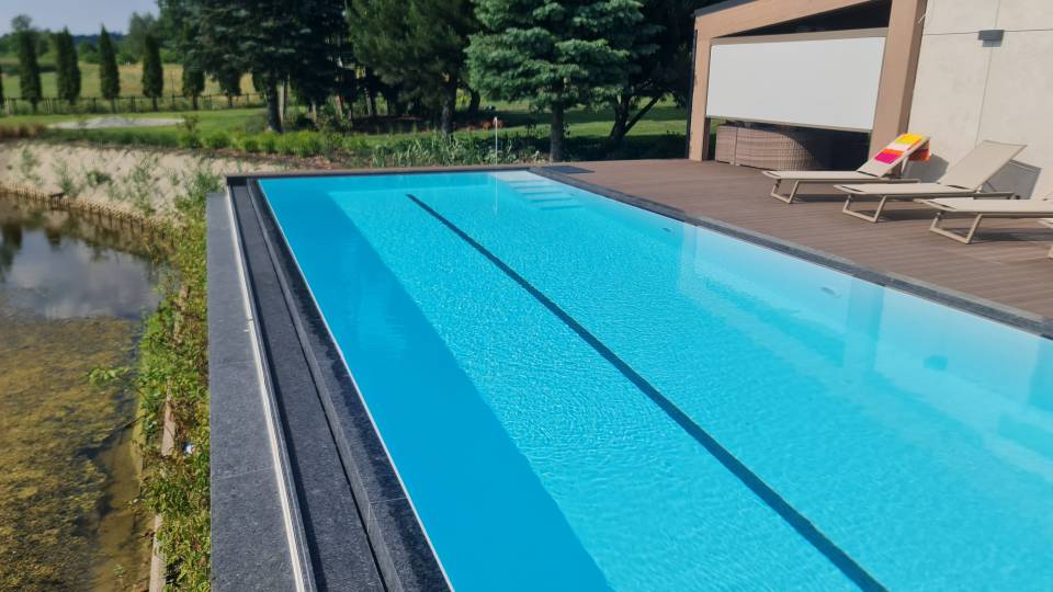 Luxury swimming pool with natural stone , infinity edge. Luxury swimming pool with natural stone , infinity edge.
