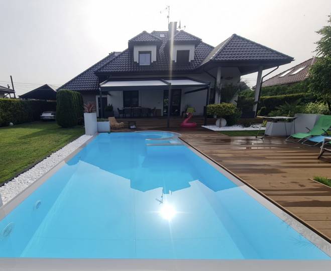 Corian garden swimming pool with spa area. Corian garden swimming pool with spa area.
