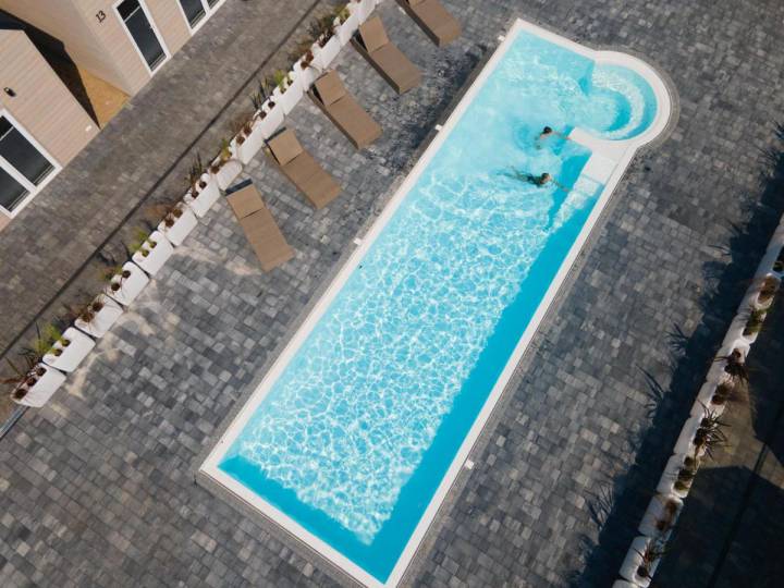 Luxury swimming pool with spa area. Luxury swimming pool with spa area.